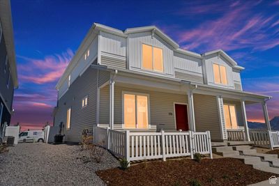 View of front of home with a porch | Image 1