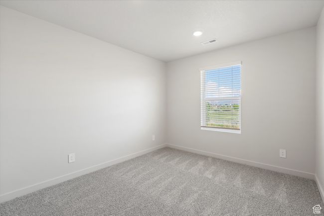 Unfurnished room featuring baseboards and light colored carpet | Image 42