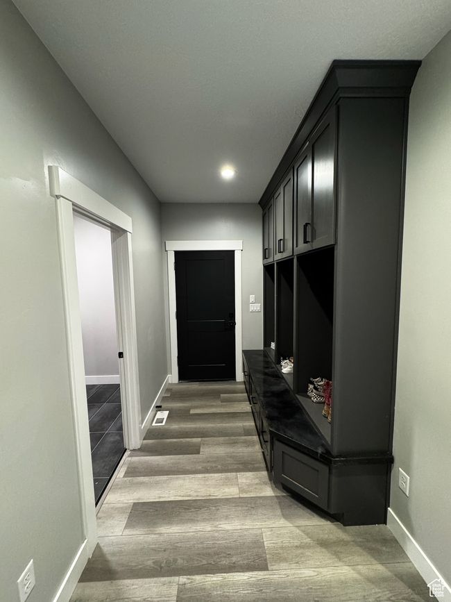 Mudroom with baseboards, wood finished floors, and recessed lighting | Image 14