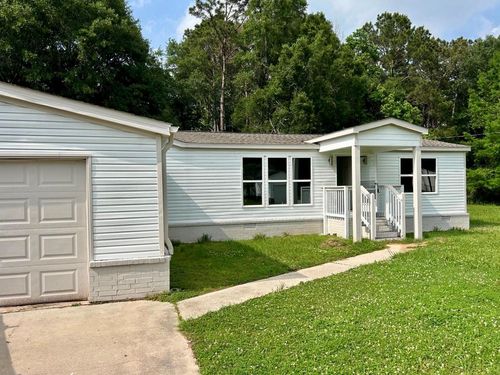 16211 Lone Star Ranch Dr, Conroe, TX, 77302-8303 | Card Image