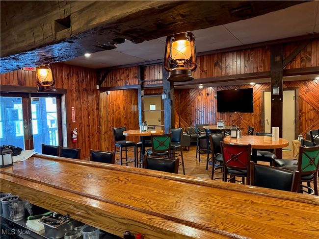 Rec room featuring wood walls | Image 20