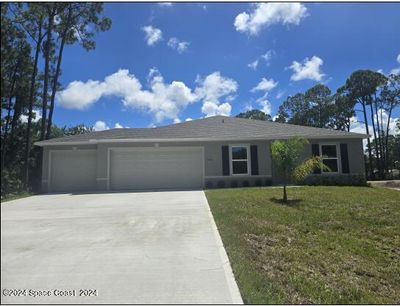 546 Trumpet Street Sw, House other with 4 bedrooms, 2 bathrooms and null parking in Palm Bay FL | Image 1