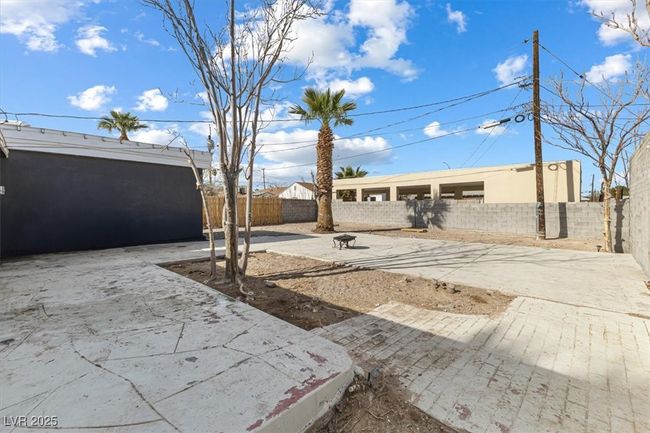 View of yard featuring a patio area and a fenced backyard | Image 25