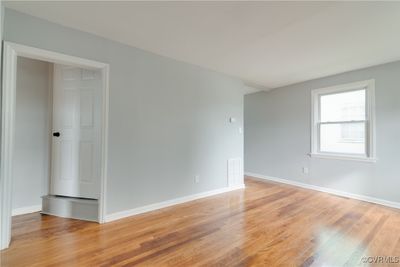 Spare room with light wood-type flooring | Image 3