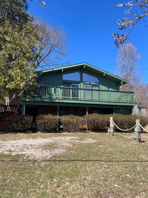 11610 Sw Torch Lake Dr, Rapid City, MI, 49676-9325 | Card Image