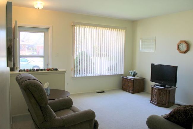 SPACIOUS LIVING ROOM W/A CHARMING B.I. FLOWER BOX! | Image 6