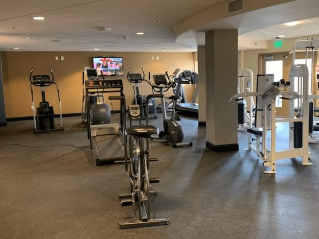 Community Gym - Exercise room with baseboards and recessed lighting | Image 31