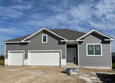 3244 Jandura Ave NE- Cul De Sac homesite offering nature views! Highlights include a 4 BAY GARAGE, unfinished walkout lower level, Pella windows, & stone accents (will be installed soon). No other homes will be built on one side of this home. | Image 1