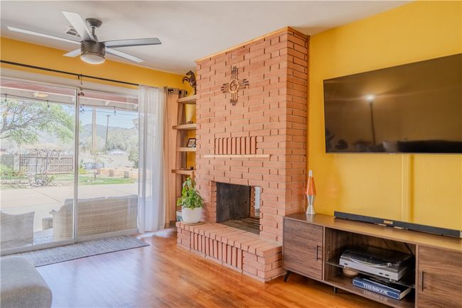 Double sided fire place. The opposite side is the dining space | Image 6