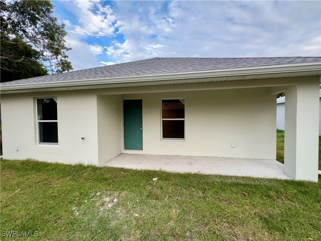 Back of property with a patio area and a lawn | Image 17