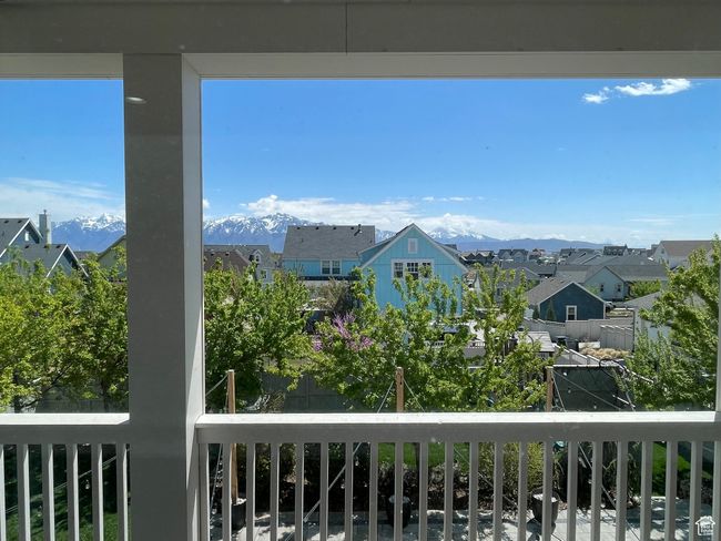 Balcony with a mountain view and a residential view | Image 28