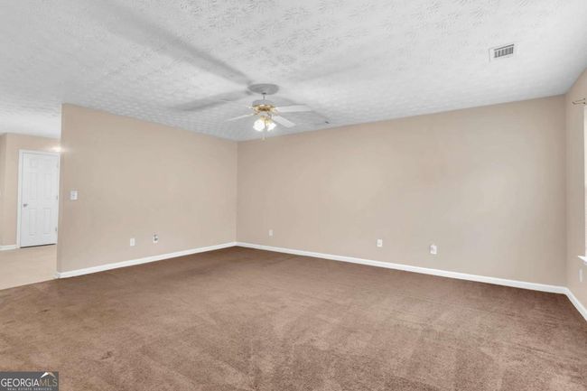 5566 Pineridge Ct, Townhouse with 3 bedrooms, 3 bathrooms and 2 parking in Forest Park GA | Image 4