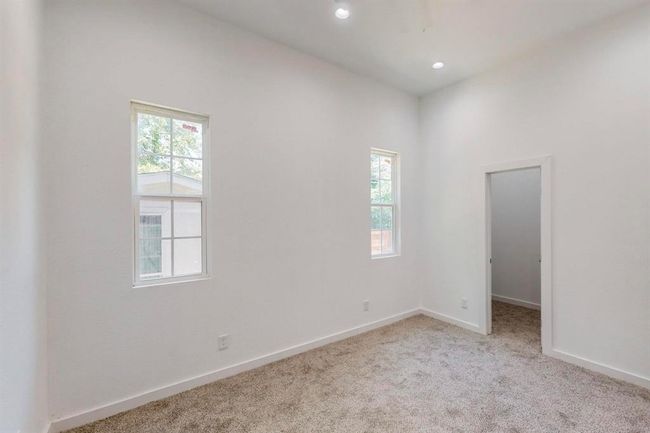 Spare room with light carpet | Image 19