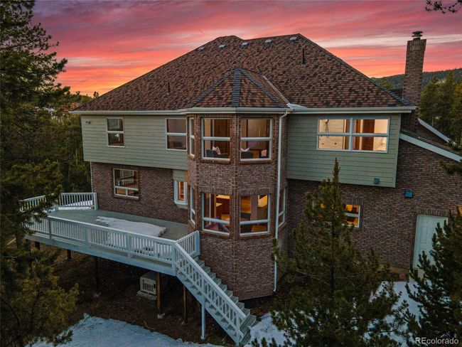 9303 Dauntless Way, House other with 4 bedrooms, 4 bathrooms and null parking in Conifer CO | Image 49