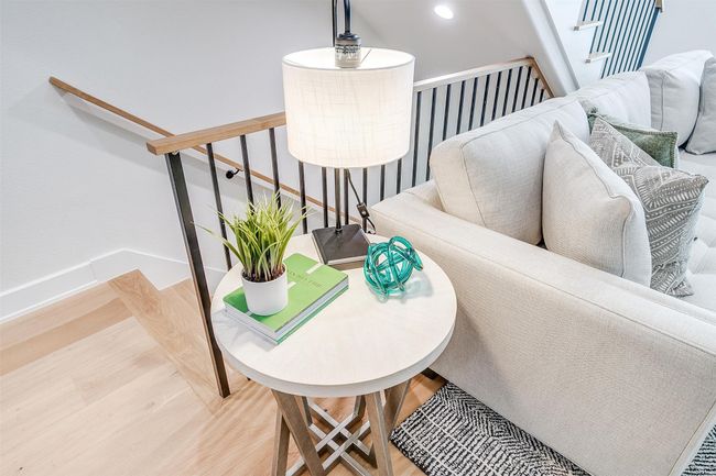 Stairs with wood finished floors and baseboards | Image 14