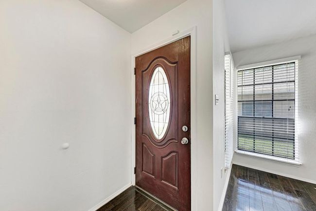 Foyer with baseboards and dark wood-style flooring | Image 5