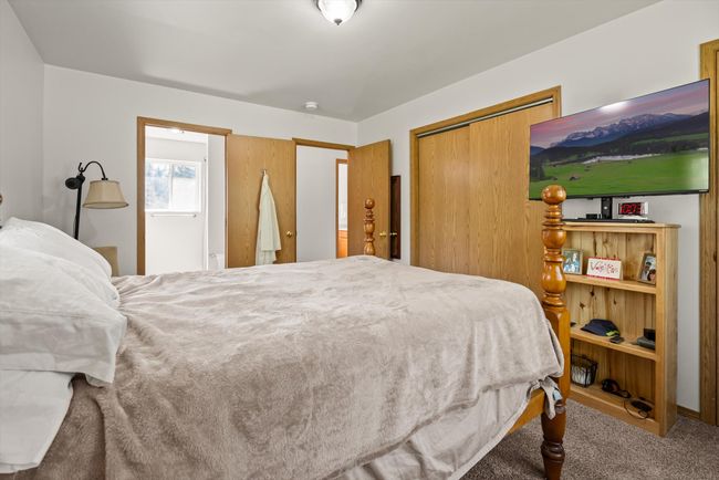 Bedroom featuring carpet floors and a closet | Image 19