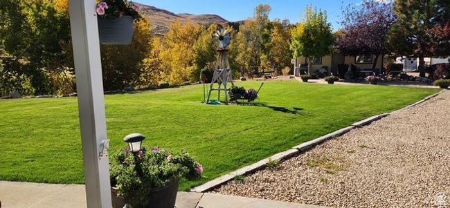View of property's community with a yard | Image 22