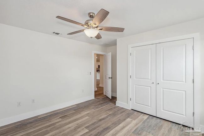 8512 Esplanade St, House other with 4 bedrooms, 2 bathrooms and 2 parking in Navarre FL | Image 8
