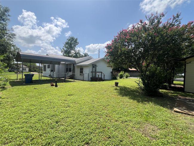 View of yard with a detached carport | Image 24