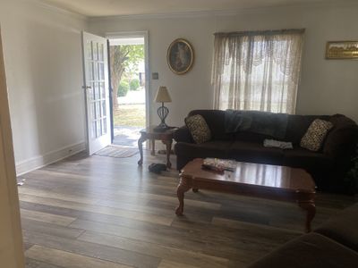 New laminate flooring in the living room. | Image 3