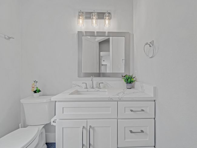 Half bath featuring toilet and vanity | Image 28