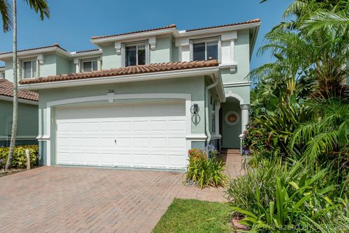 2146 Oakmont Dr, Riviera Beach, FL, 33404-1831 | Card Image