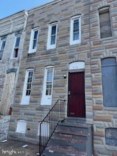 307 S Pulaski Street, Townhouse with 3 bedrooms, 1 bathrooms and null parking in BALTIMORE MD | Image 1