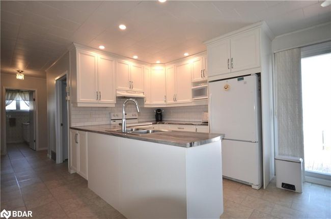 11704 Highway 64, House other with 4 bedrooms, 2 bathrooms and 5 parking in Verner ON | Image 7