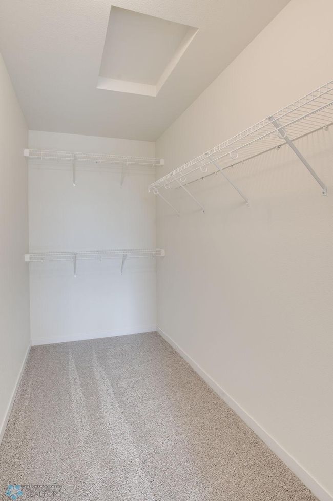 Primary Bedroom Walk in Closet | Image 19