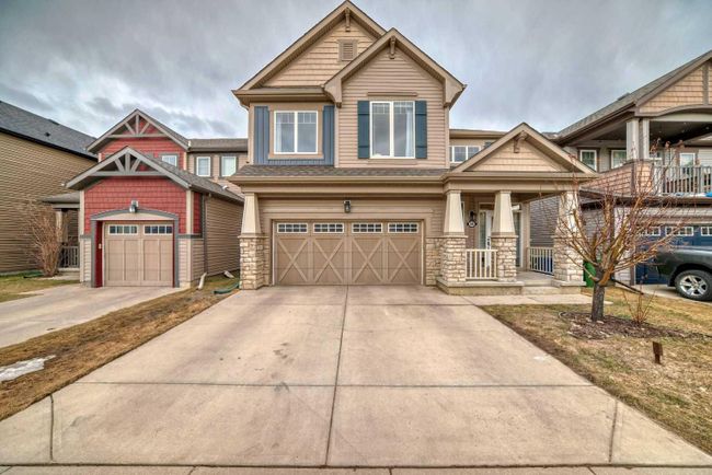 34 Windcreek Terrace Sw, Home with 4 bedrooms, 3 bathrooms and 4 parking in Airdrie AB | Image 1