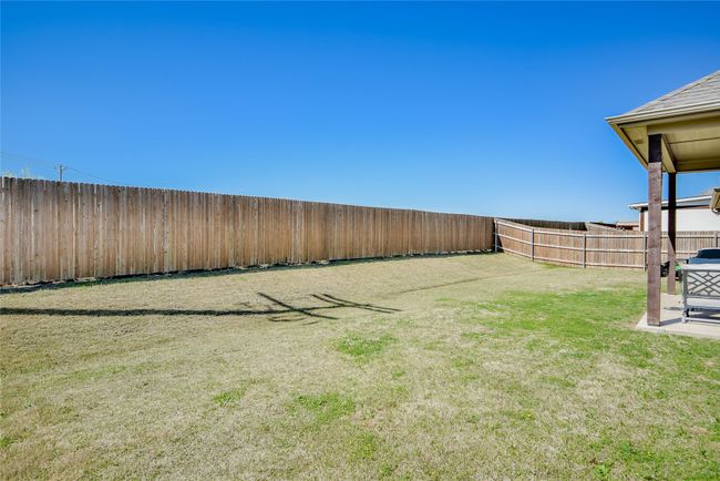 View of yard featuring a fenced backyard | Image 34