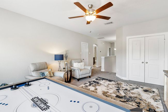 Spacious and inviting, this game room is perfect for the kids—or easily transforms into the ultimate media room, playroom, or creative retreat. | Image 31