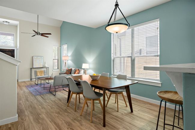Framed by natural light, it feels cozy yet open—an easy spot to gather, work, or linger over coffee | Image 10