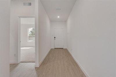 Hall featuring light hardwood / wood-style flooring | Image 2