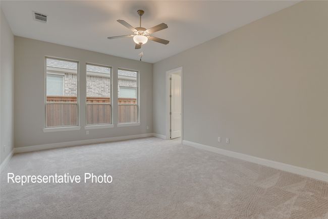 Empty room featuring a ceiling fan and light carpet | Image 8