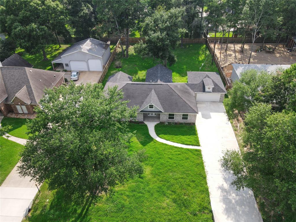 Garrett Dr, Magnolia, TX 77354