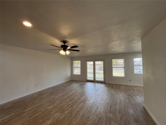 Large Living Room is open to Dining and Kitchen | Image 6