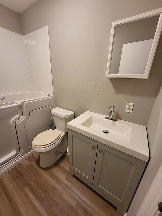 Primary bathroom with new vanity & countertop | Image 11