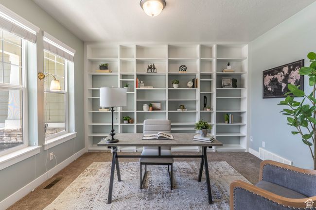 Office/Library with carpet and built-in shelving. | Image 13
