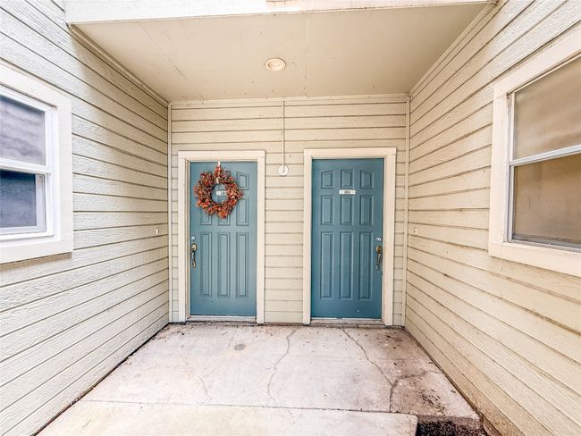 Doorway to property featuring a patio area | Image 24