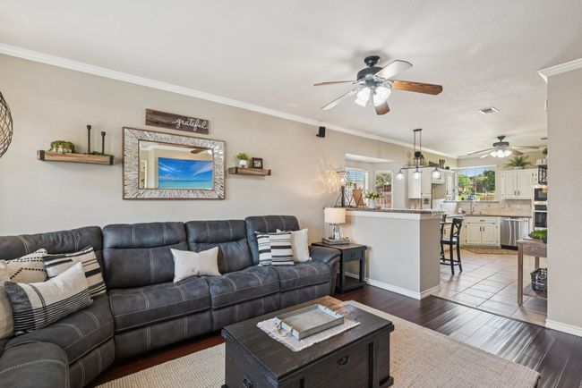 Love the open family room that is adjacent to the eat in kitchen. | Image 10