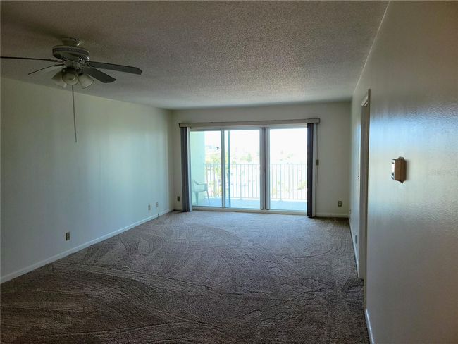 Spacious Great Room opens to a Private Balcony | Image 5