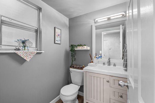 Bathroom featuring vanity and wood finished floors | Image 6