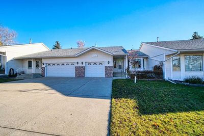 56 Riverview Dr Se, Home with 1 bedrooms, 2 bathrooms and 2 parking in Calgary AB | Image 2