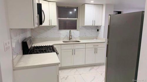 70-51 45th Ave, Woodside, NY, 11377-5106 | Card Image