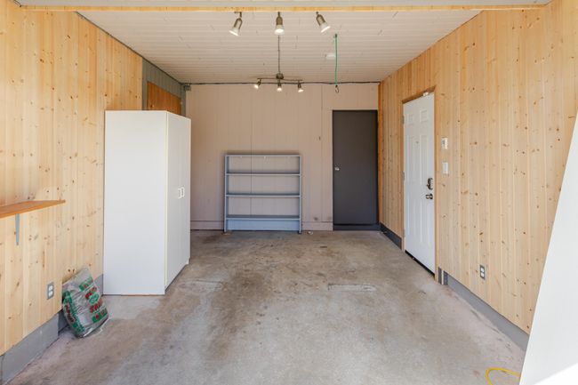 Garage with wood walls | Image 37