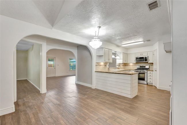 View of kitchen and breakfast area | Image 4