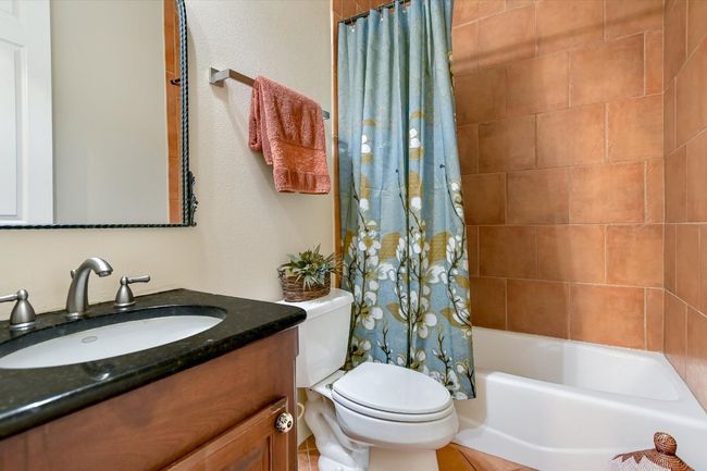 Downstairs: Hall Bathroom with vanity and shower / bathtub combination | Image 17