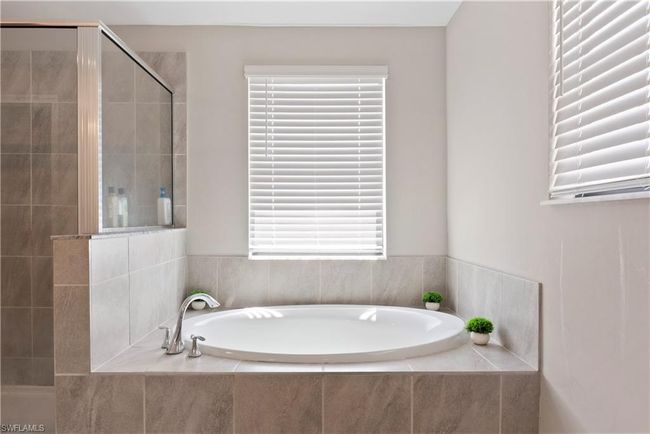 Full bath with a bath and a shower stall | Image 22